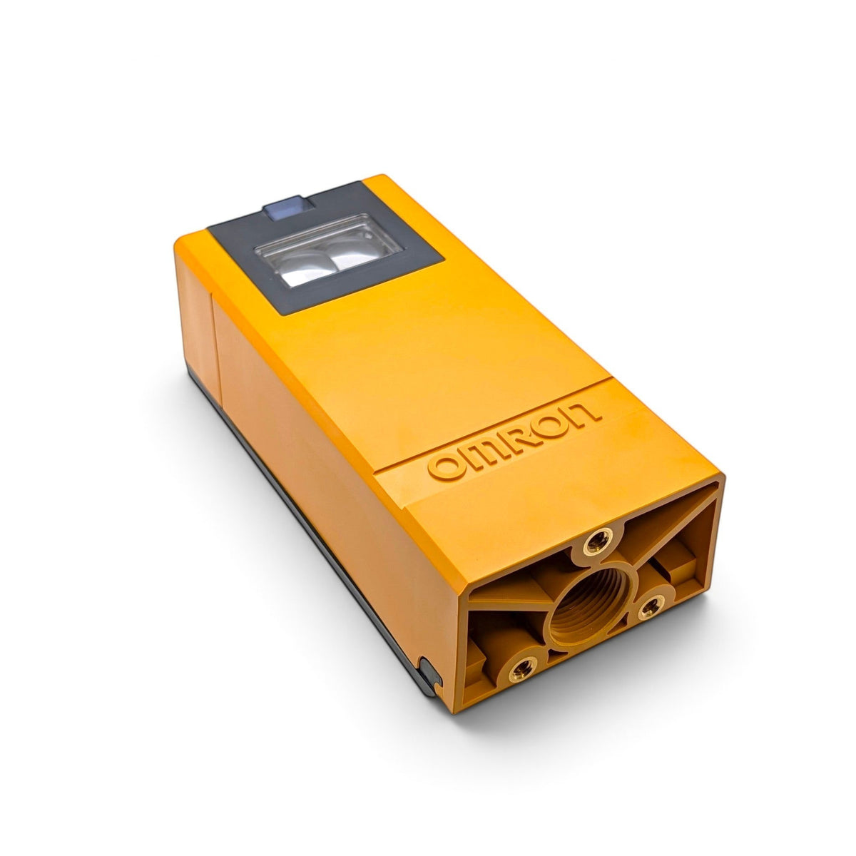 Omron E3K-R10K4-NR-1 photo eye three-quarter view showing yellow-orange housing depth
